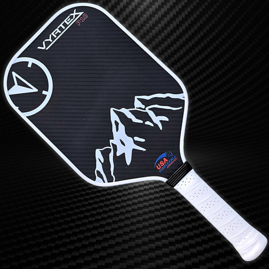 The Vyrtex Precision 10 carbon fiber pickleball paddle main photo with carbon backdrop